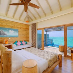Schlafzimmer eines Bungalows des You & Me Cocoon Maledives