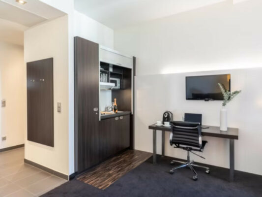 Hotelzimmer mit Küchenzeile im Garner Hotel Mitte